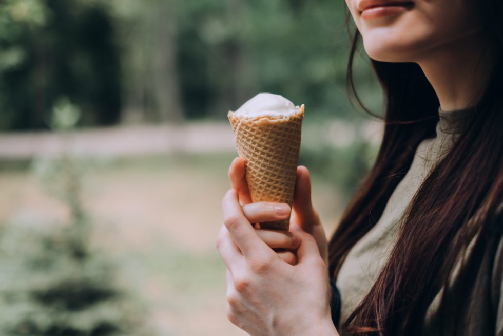 Woman eating ice cream cone